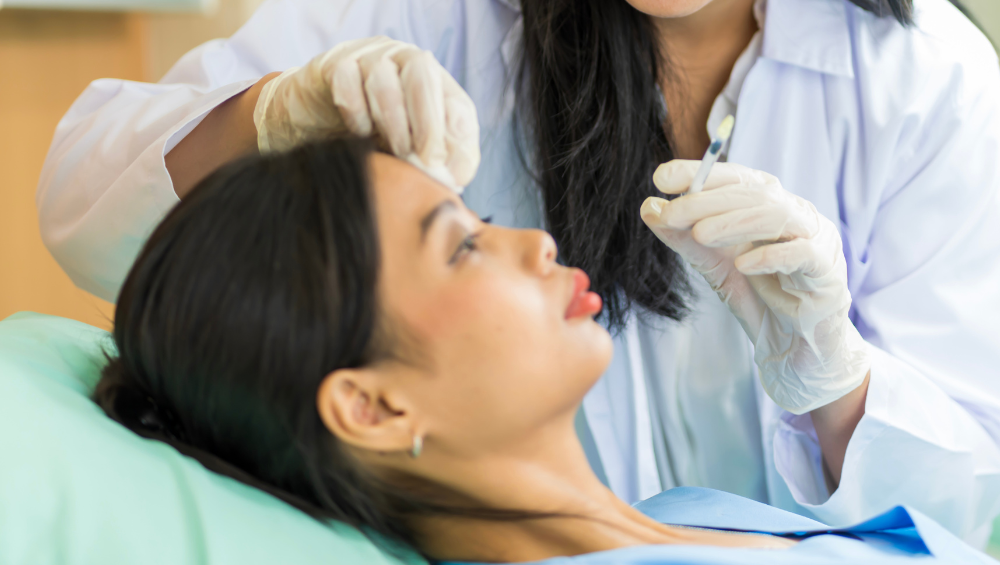 doctor prepping patient for Botox in San Diego