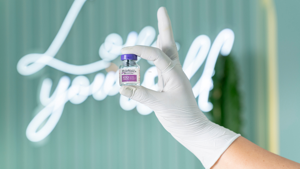 woman holding neurotoxin vial at botox clinic in Wildomar